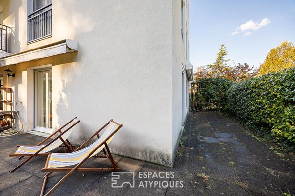 Appartement en rez-de-jardin avec terrasse à Caluire