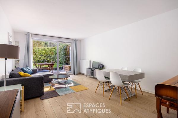 Appartement en rez-de-jardin avec terrasse à Caluire