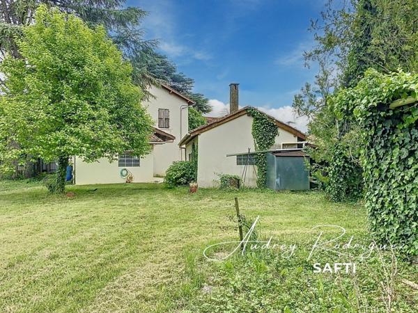 Maison familiale avec jardin et dépendances
