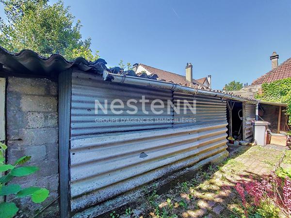 Maison de plain-pied avec jardin et dépendance à Morangis (91)