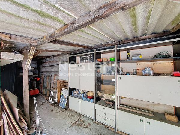 Maison de plain-pied avec jardin et dépendance à Morangis (91)