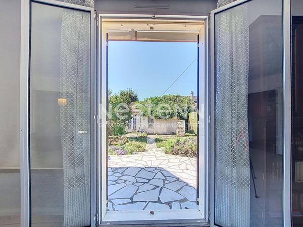 Maison de plain-pied avec jardin et dépendance à Morangis (91)