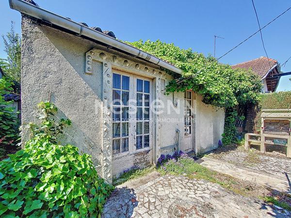 Maison de plain-pied avec jardin et dépendance à Morangis (91)