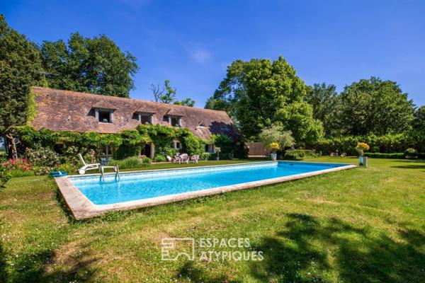 Propriété de charme dans un parc verdoyant avec piscine et dépendance