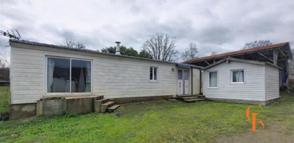 Chalet + 2 bâtisses à rénover + hangar