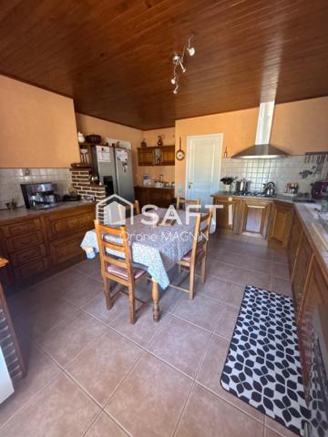 Maison familiale avec terrain arboré