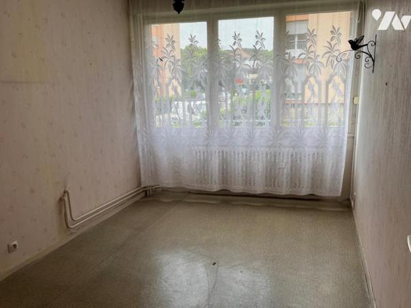 appt type IV rez de chaussée surélevé  sis à CHENOVE