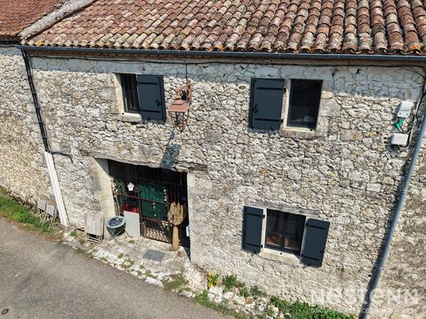Location maison en pierre de 113 m² à Saint-Mézard avec 3 chambres, bureau et vaste pièce de vie