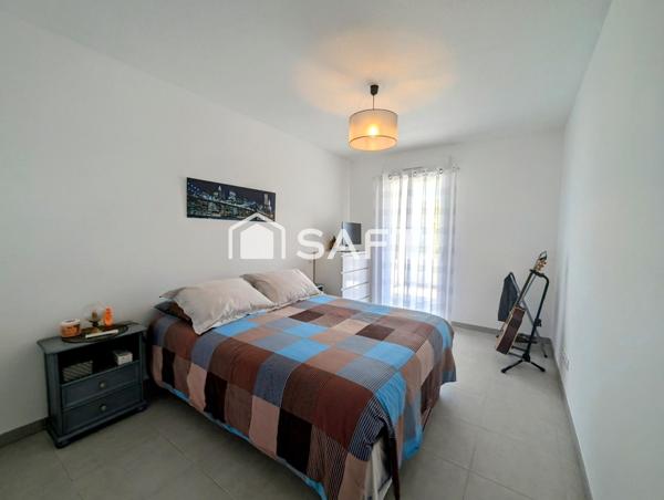 Appartement moderne et confortable avec spacieuse terrasse, garage et cave