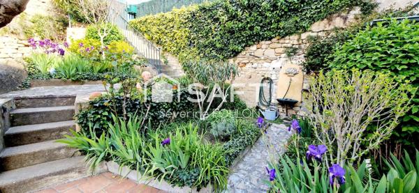 Dans maison, charmant appartement de 55 m² à Apt avec jardin, 2 garages et 1 cave – proche centre-ville