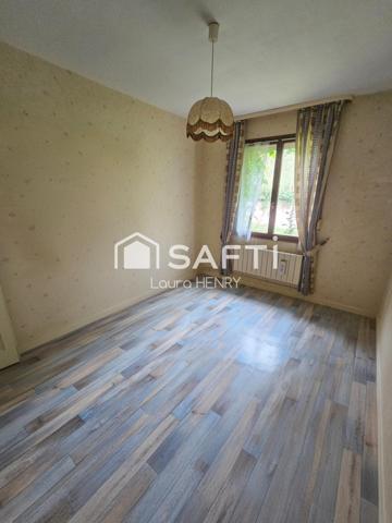 Située dans un quartier calme, maison de 3 chambres avec garage et jardin