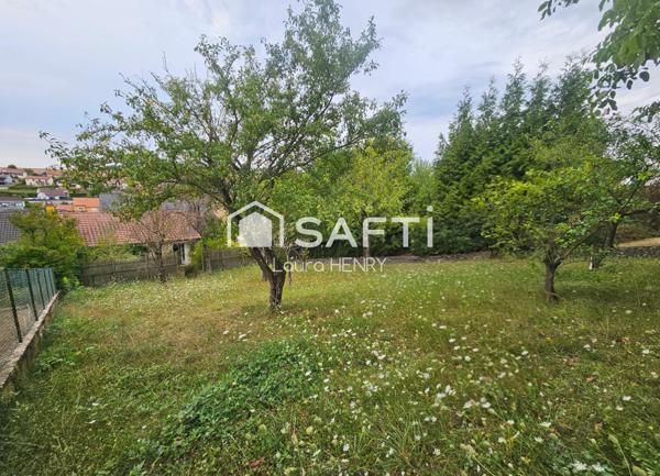 Située dans un quartier calme, maison de 3 chambres avec garage et jardin