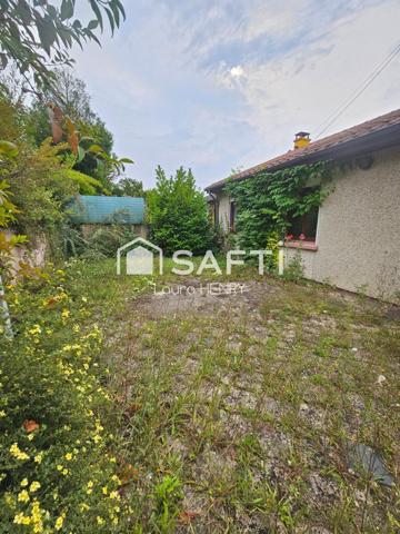 Située dans un quartier calme, maison de 3 chambres avec garage et jardin