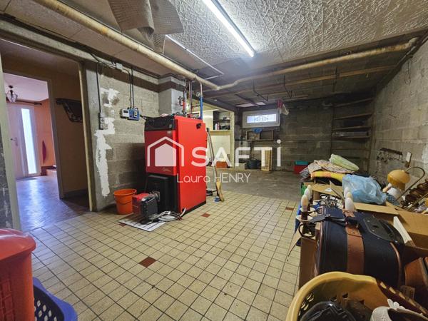 Située dans un quartier calme, maison de 3 chambres avec garage et jardin