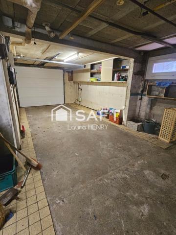 Située dans un quartier calme, maison de 3 chambres avec garage et jardin