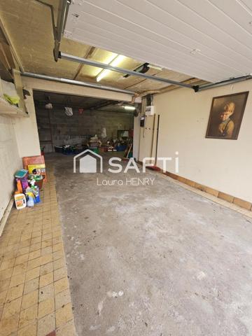 Située dans un quartier calme, maison de 3 chambres avec garage et jardin