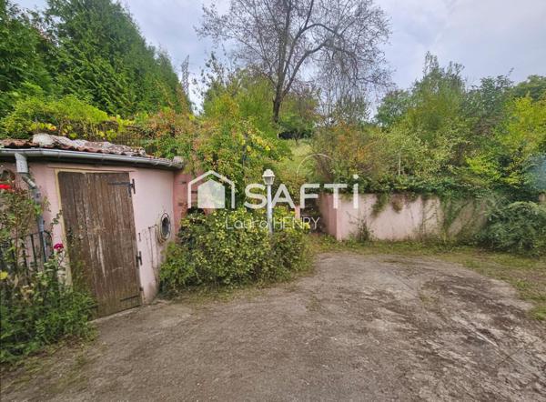 Située dans un quartier calme, maison de 3 chambres avec garage et jardin
