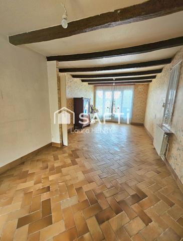 Située dans un quartier calme, maison de 3 chambres avec garage et jardin