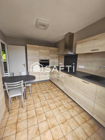 Située dans un quartier calme, maison de 3 chambres avec garage et jardin