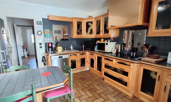 Plain pied de 3 chambres sur terrain de 1 400 m²