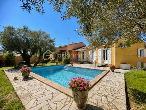 !!!! OFFRE ACCEPTEE !!!!

EN EXCLUSIVITÉ – Maison provençale avec piscine et dépendance – Saint-Laurent-d’Aigouze

À découvrir sans tarder : située hors lotissement, dans un environnement calme et agréable, cette charmante maison de style provençal construite en 1997 vous séduira par son potentiel, ses volumes et ses nombreuses possibilités d’usage.

Édifiée sur une parcelle entièrement close et arborée, elle bénéficie d’un agréable espace extérieur avec piscine et pool house, idéal pour profiter pleinement des beaux jours et d'un emplacement parking pour vos véhicules.

La propriété se compose de deux logements totalement indépendants, offrant une réelle flexibilité : résidence familiale, activité libérale, accueil de proches ou revenu complémentaire grâce à la location saisonnière.

""" La maison principale – environ 109 m²
Elle comprend :
- une entrée
- une spacieuse pièce de vie lumineuse regroupant le salon séjour et la cuisine ouverte entièrement équipée
- un dégagement desservant des toilettes indépendantes, une buanderie et une grande salle de bains avec douche
- 2 belles chambres avec grands placards, avec possibilité de recréer facilement une 3ᵉ chambre, comme à l’origine

""" Le logement indépendant – environ 40 m². Idéal pour recevoir ou générer un revenu locatif :
Idéal pour recevoir ou générer un revenu locatif :
- une pièce de vie avec cuisine aménagée
- une chambre avec placard
- une salle d’eau avec WC

Quelques travaux seront à prévoir afin de rendre ce bien parfait et vous laissera l’opportunité de le personnaliser à votre goût.

Les plus de la localisation :
* Centre du village et ses commerces accessible à pied en 15 minutes
* Aigues-Mortes à 10 minutes
* Plages et bord de mer à seulement 20 minutes
* Montpellier et Nîmes à environ 30 minutes

Un bien aux multiples possibilités, rare sur le secteur – idéal pour une famille, un projet mixte ou un investissement locatif.
****Certaines photos ont été généré par IA***
Contactez moi pour organiser une visite !