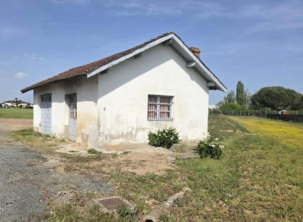 Terrain plat avec dépendance à Villeneuve sur Lot