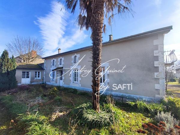 Maison avec dépendances et terrain divisible