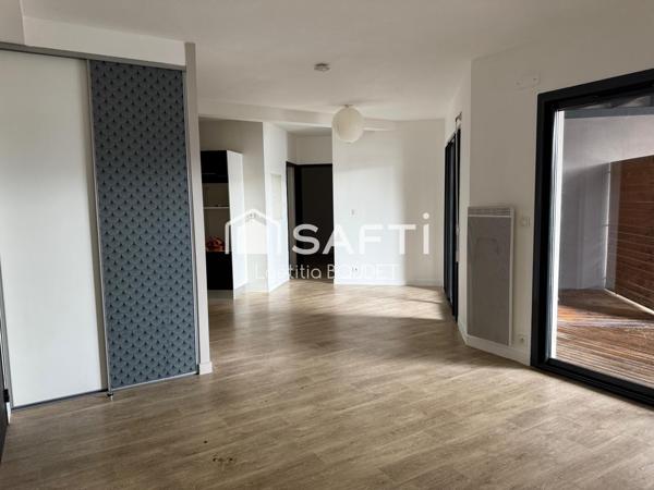 APPARTEMENT 1 CHAMBRE AVEC TERRASSE ET PLACE DE STATIONNEMENT