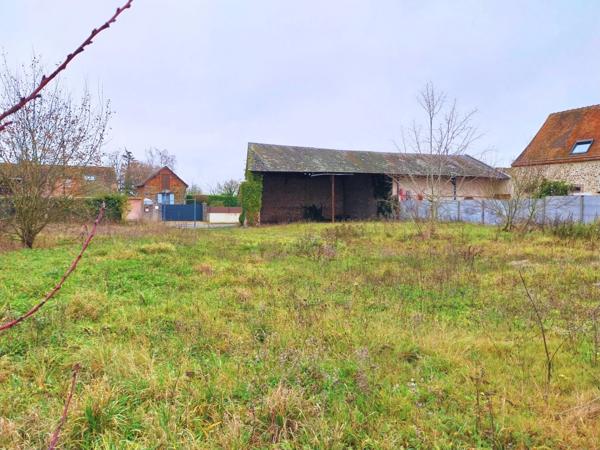 Terrain et grange