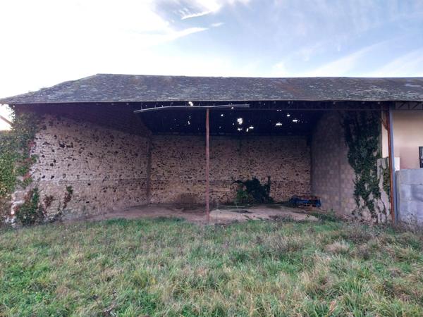 Terrain et grange