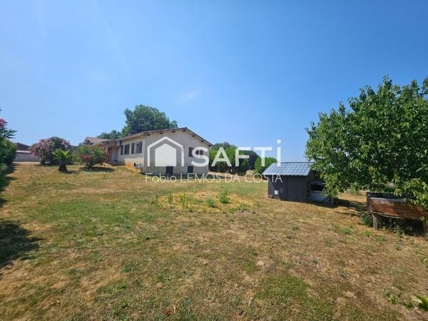 VILLA DE PLAIN PIED AVEC GARAGE ET JARDIN CLÔTURÉE
