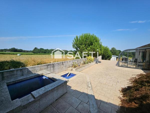 VILLA DE PLAIN PIED AVEC GARAGE ET JARDIN CLÔTURÉE