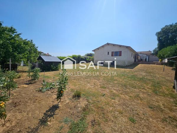 VILLA DE PLAIN PIED AVEC GARAGE ET JARDIN CLÔTURÉE