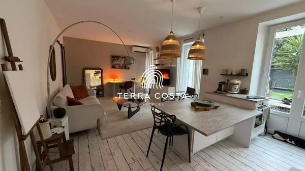 Charme des années 30 - art de vivre en rez-de-jardin