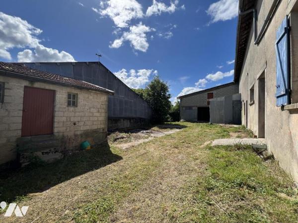 Maison d'habitation mitoyenne