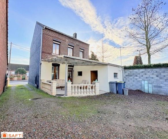 Maison individuelle à Quiévrechain avec garage +passage sur coté+ dépendances /4 chambres !!