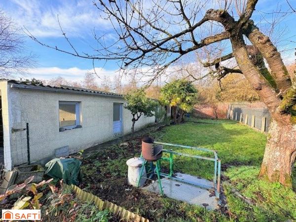 Maison individuelle à Quiévrechain avec garage +passage sur coté+ dépendances /4 chambres !!