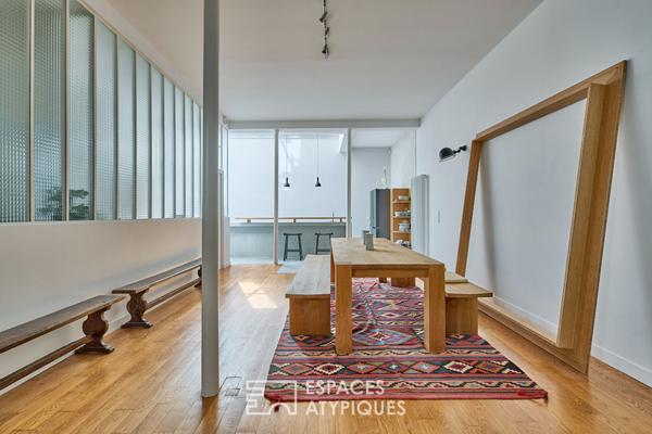 Ancien atelier transformé en loft de 150 m² au calme sur cour végétalisée