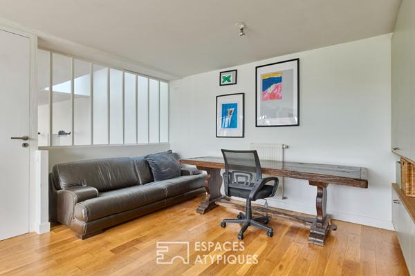 Ancien atelier transformé en loft de 150 m² au calme sur cour végétalisée