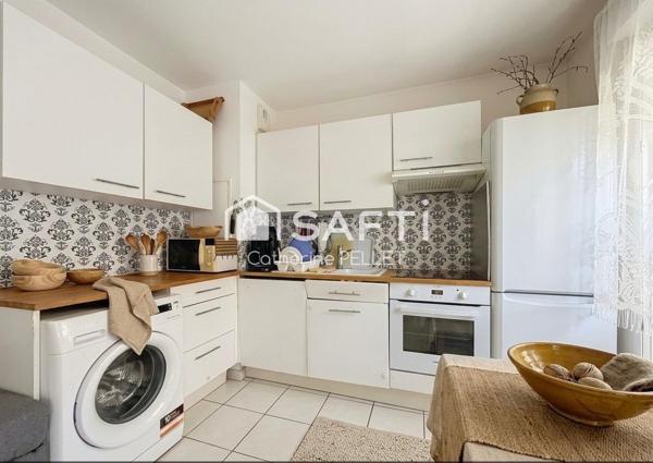 Appartement 2 pièces avec balcon et parking boxé dans résidence récente
