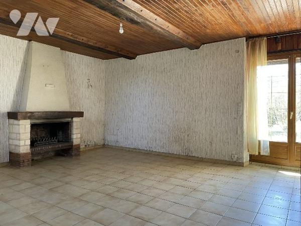 MAISON DE VILLAGE AVEC GARAGE ET JARDIN