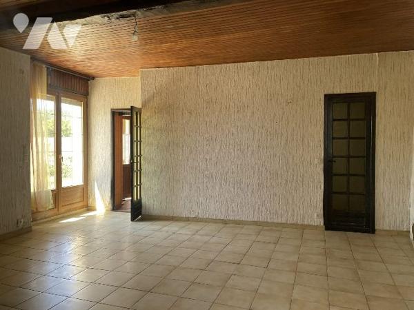 MAISON DE VILLAGE AVEC GARAGE ET JARDIN