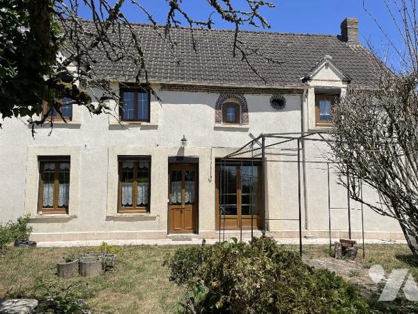 MAISON DE VILLAGE AVEC GARAGE ET JARDIN