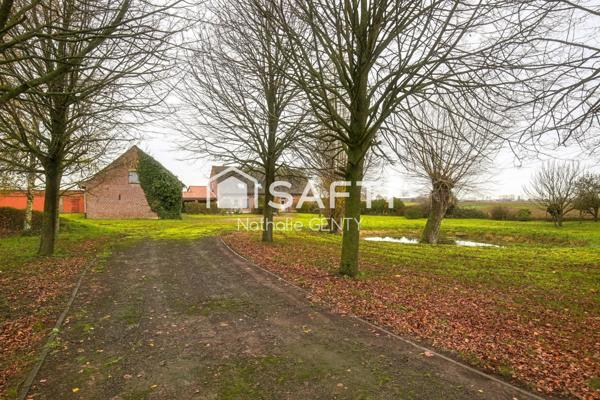 ANCIEN CORPS DE FERME AVEC CHAMBRES D'HÔTES ET DÉPENDANCES SUR UNE PARCELLE DE 8000 M2 À STEENVOORDE