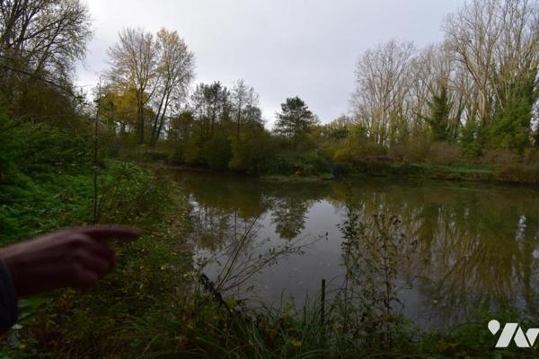 UN ENSEMBLE DE TERRAIN ET DE BOIS  AVEC ETANG , CHALET DE DETENTE ET HUTTE DE CHASSE  ENVIRON 12 Ha