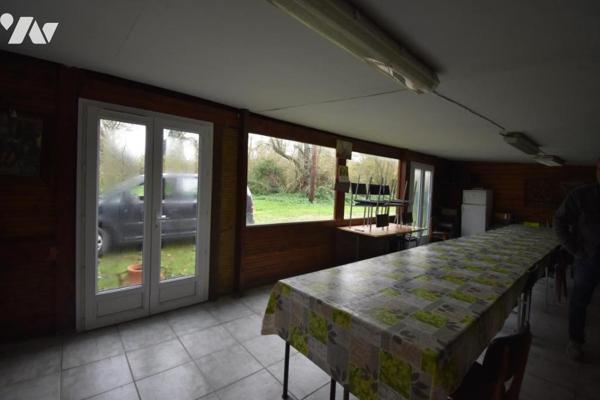 UN ENSEMBLE DE TERRAIN ET DE BOIS  AVEC ETANG , CHALET DE DETENTE ET HUTTE DE CHASSE  ENVIRON 12 Ha