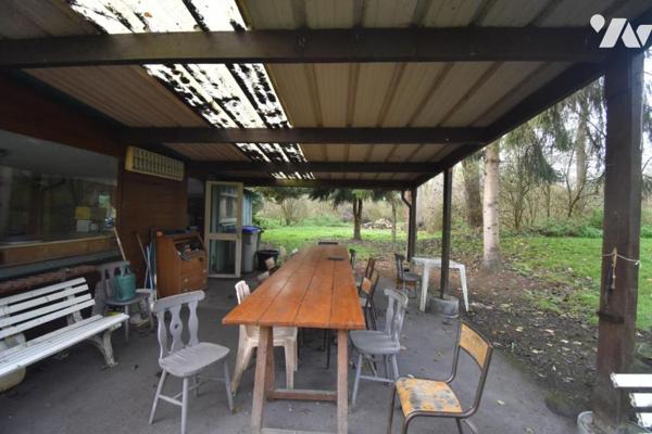 UN ENSEMBLE DE TERRAIN ET DE BOIS  AVEC ETANG , CHALET DE DETENTE ET HUTTE DE CHASSE  ENVIRON 12 Ha