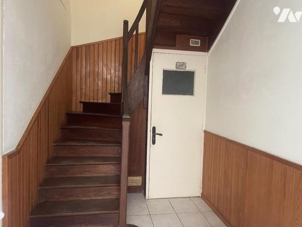 UN APPARTEMENT T4 + CAVE + JARDIN