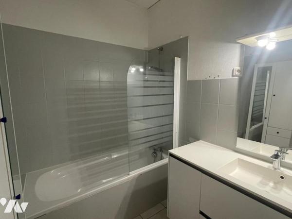 UN APPARTEMENT T4 + CAVE + JARDIN