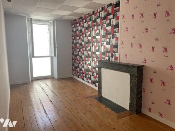 UN APPARTEMENT T4 + CAVE + JARDIN